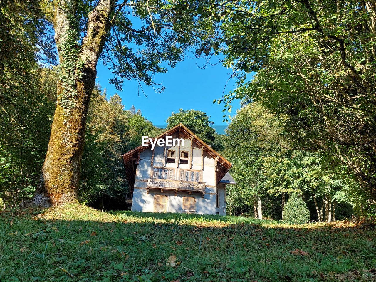 House on field against sky