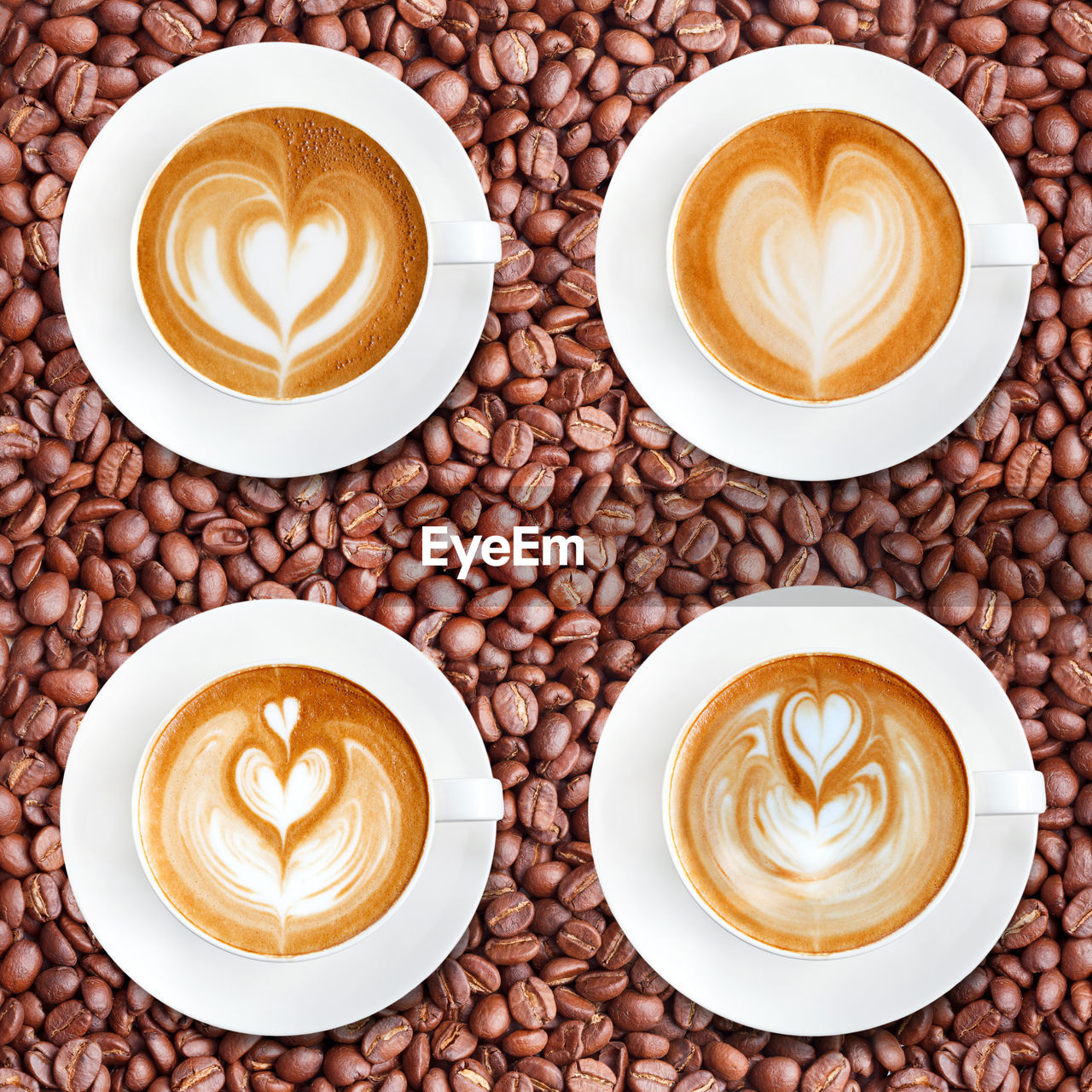 DIRECTLY ABOVE SHOT OF CAPPUCCINO COFFEE CUP WITH TEA