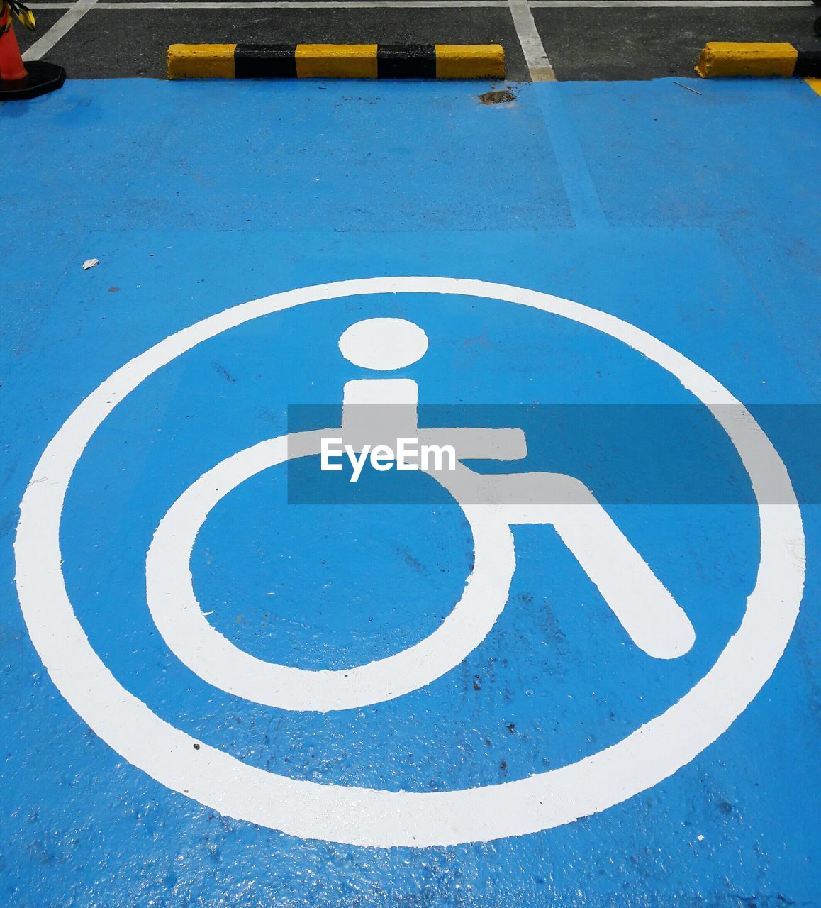 High angle view of handicapped sign on street 