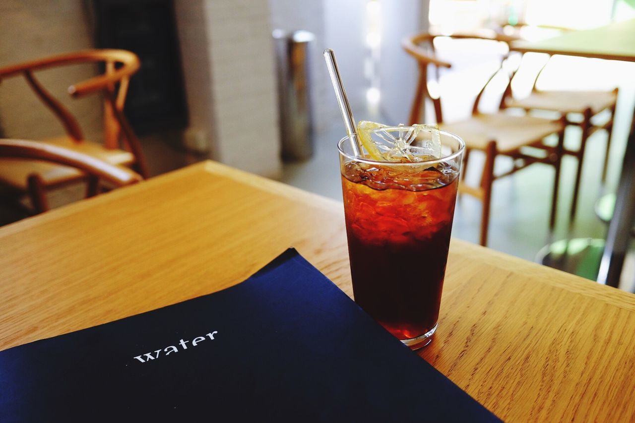 CLOSE-UP OF DRINKS ON TABLE