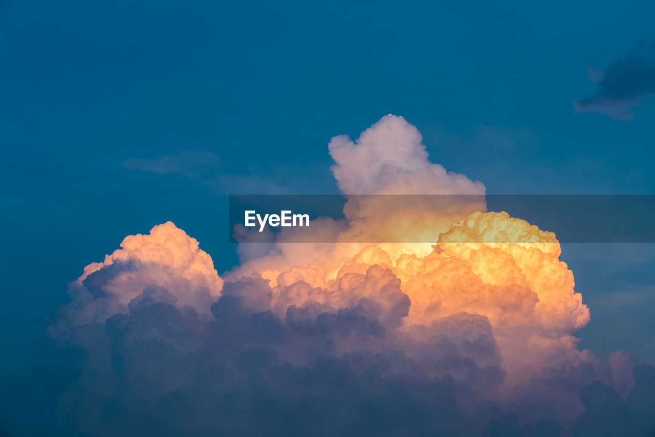 Low angle view of clouds in sky at sunset