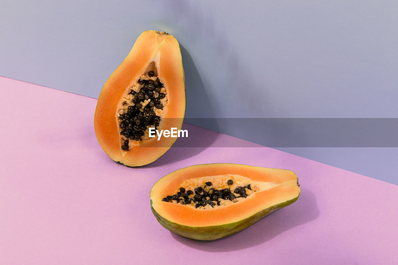 High angle view of papaya in pastel colors