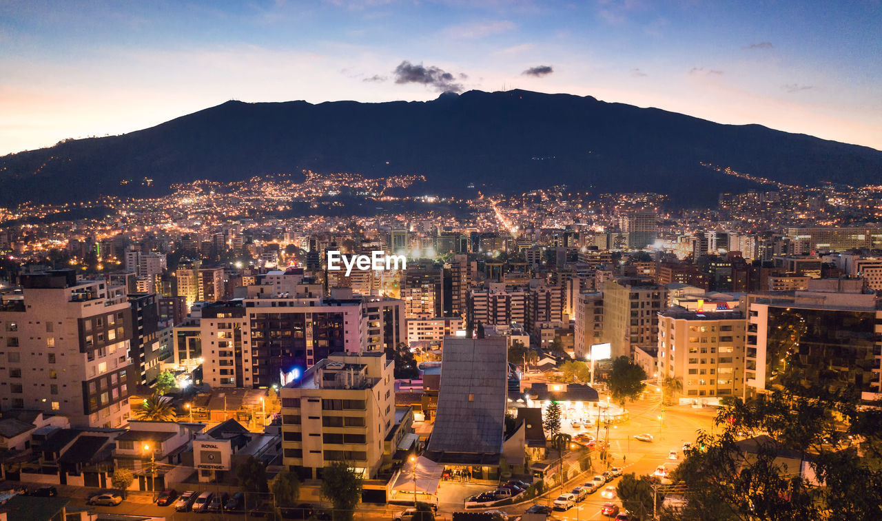 High angle view of illuminated buildings in city