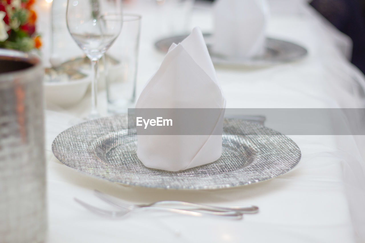 Close-up of place setting on table