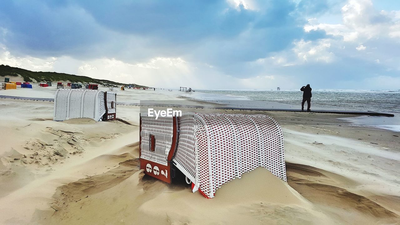 Scenic view of beach against sky