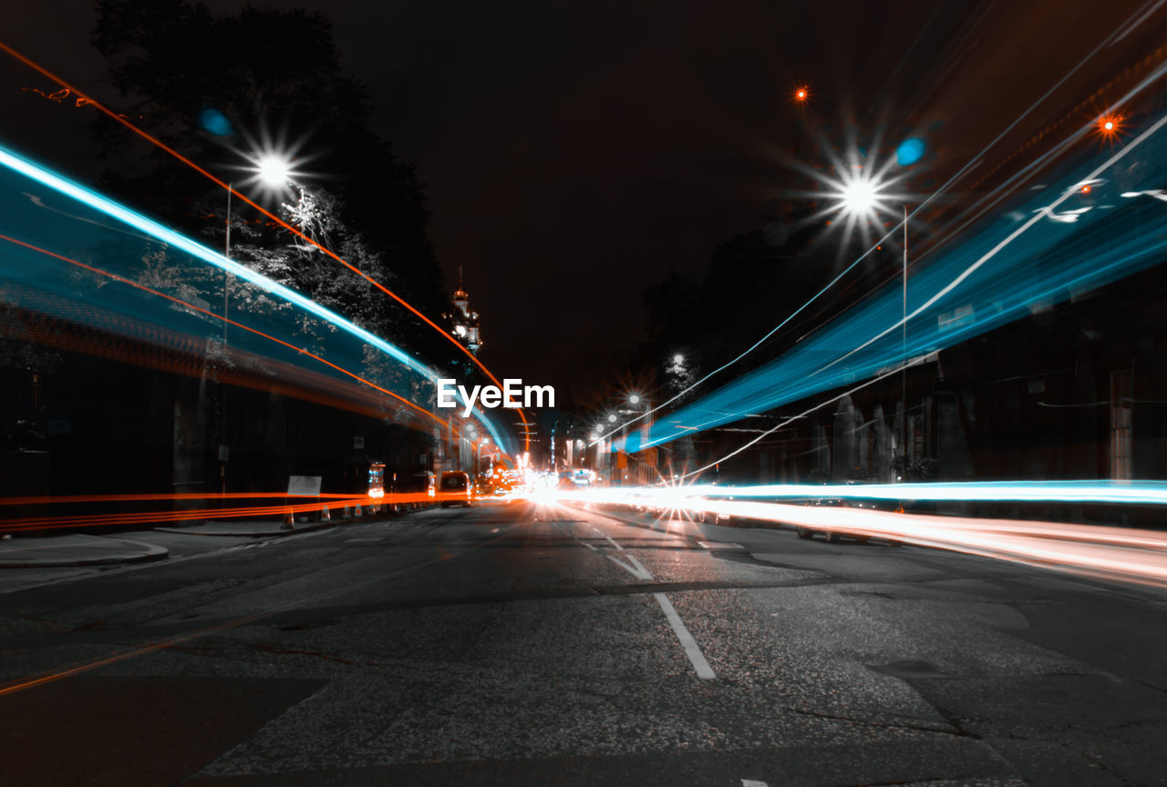 Light trails on city street at night