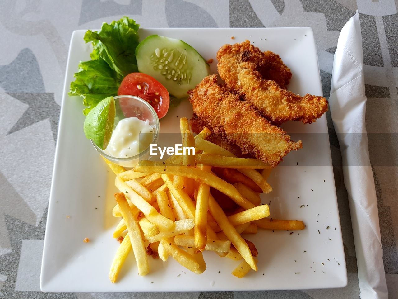 CLOSE-UP OF FOOD SERVED ON TABLE