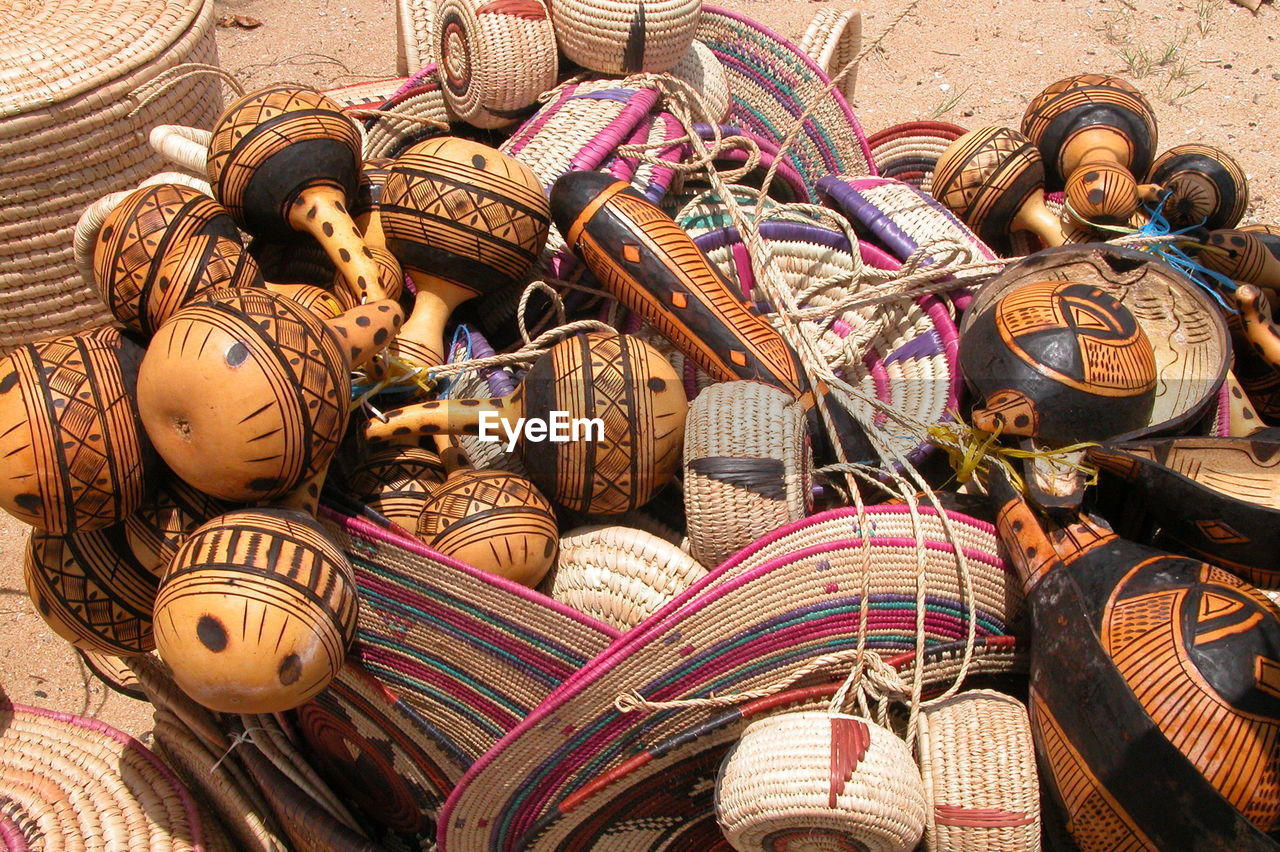 High angle view of baskets in market for sale