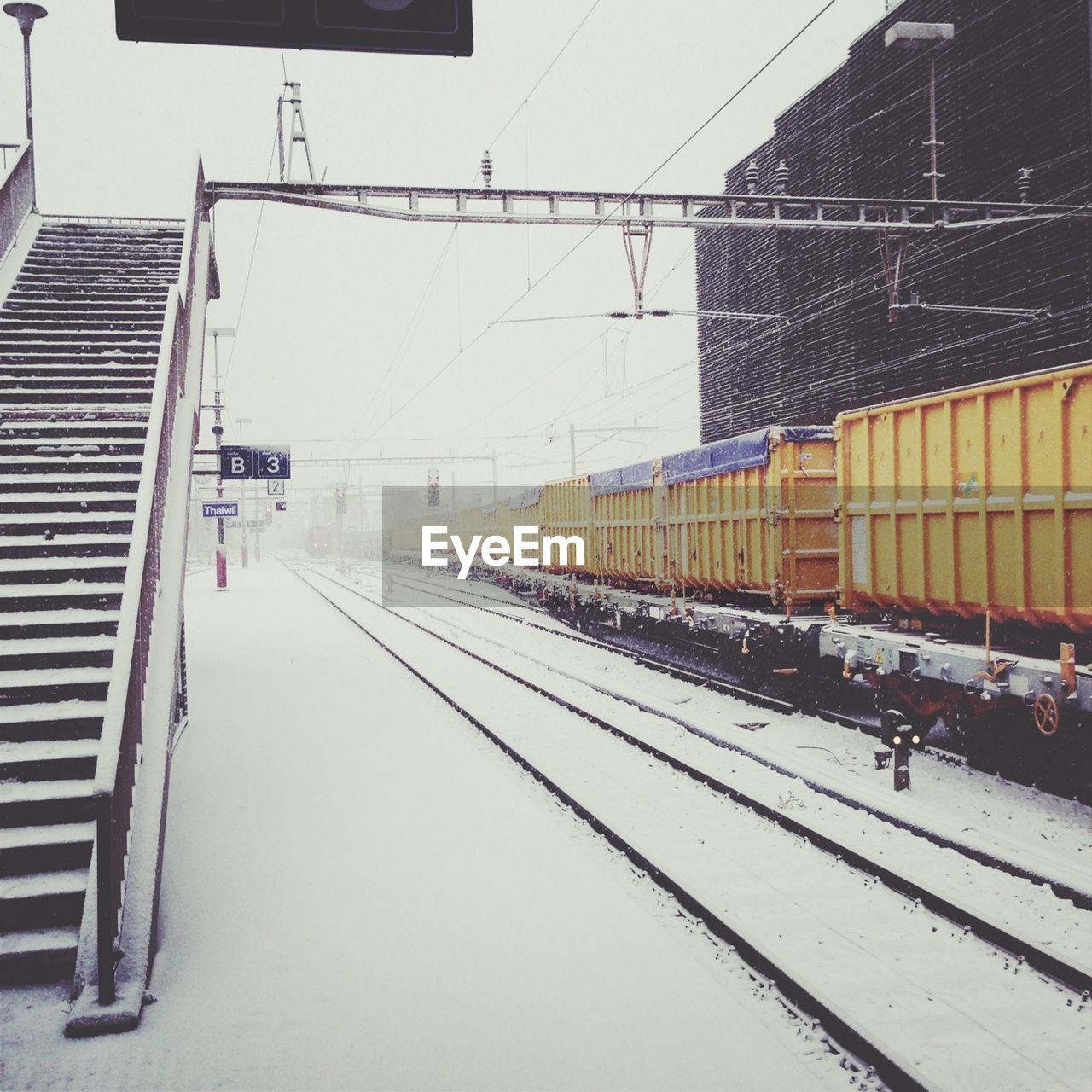 View of train and stairs in winter