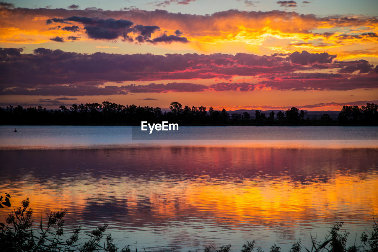 SUNSET OVER LAKE