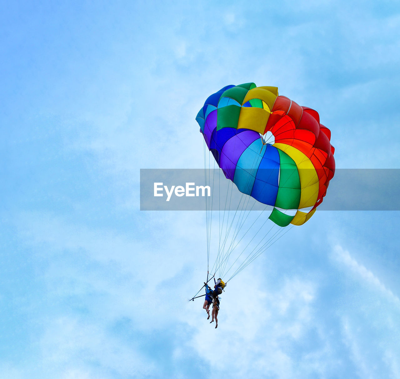 Low angle view of kite flying against sky