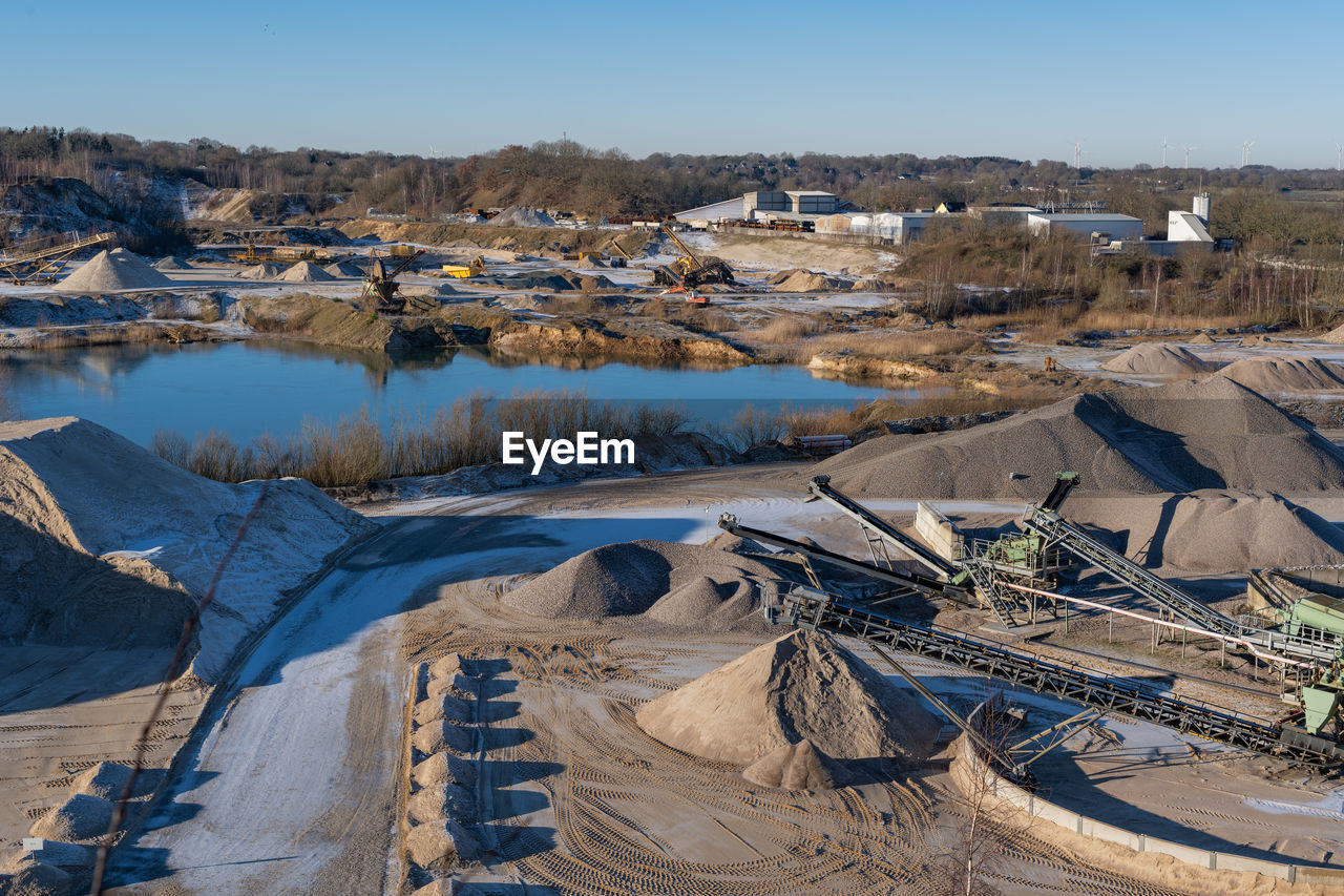 Quarry pond in a large gravel quarrying area