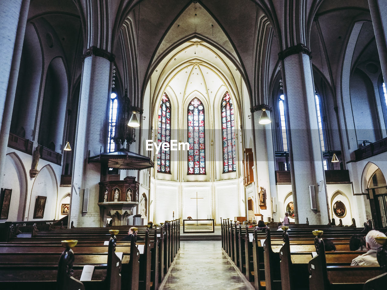 CORRIDOR OF BUILDING WITH CHURCH