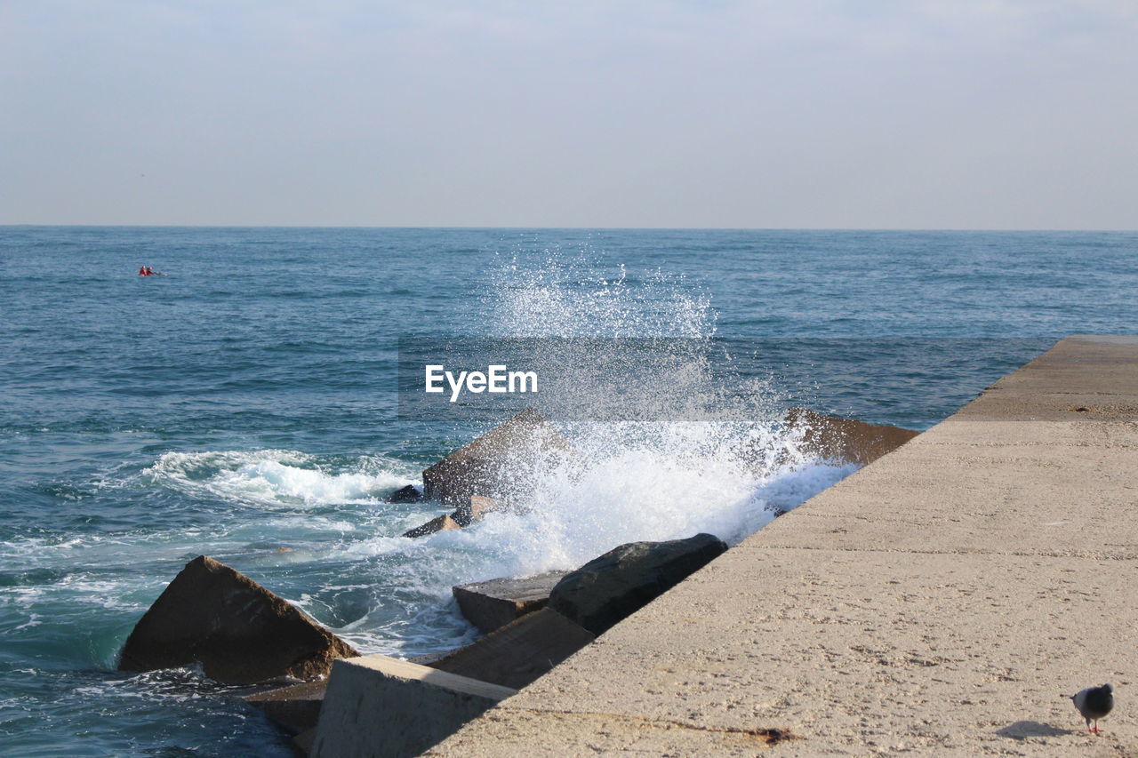 Scenic view of sea against clear sky