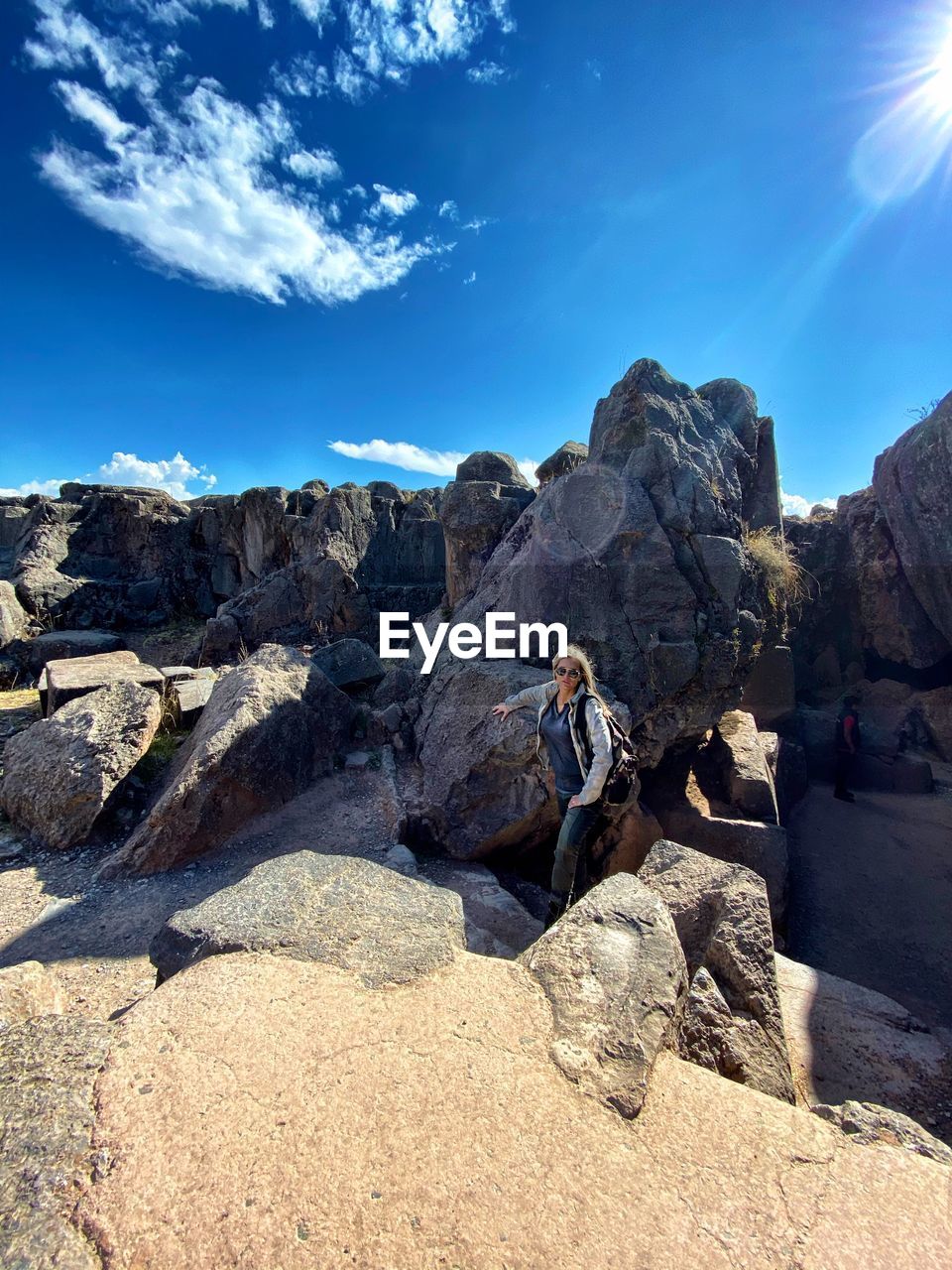 ROCK FORMATIONS AGAINST BLUE SKY