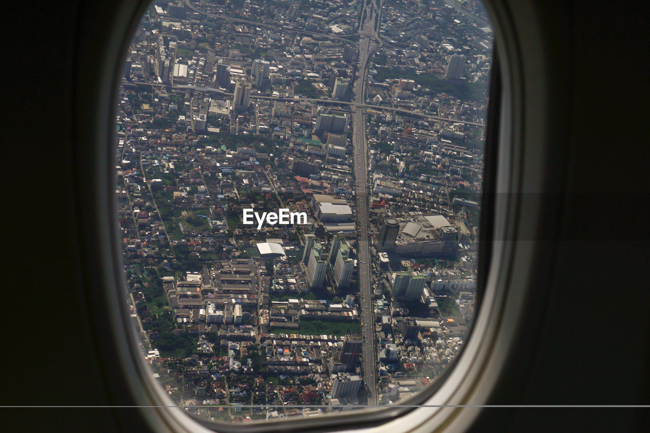 View of city seen through airplane window