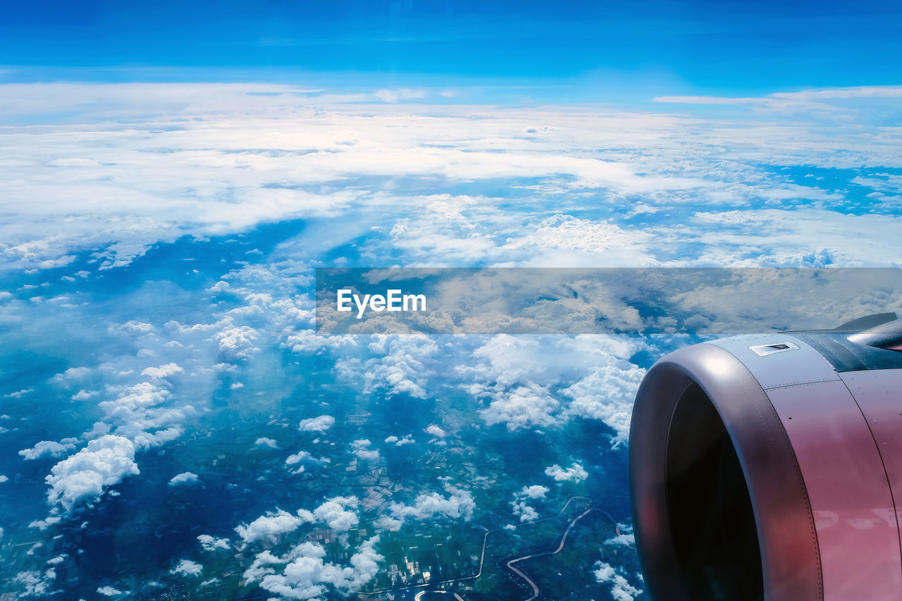 AERIAL VIEW OF CLOUDS OVER SEA