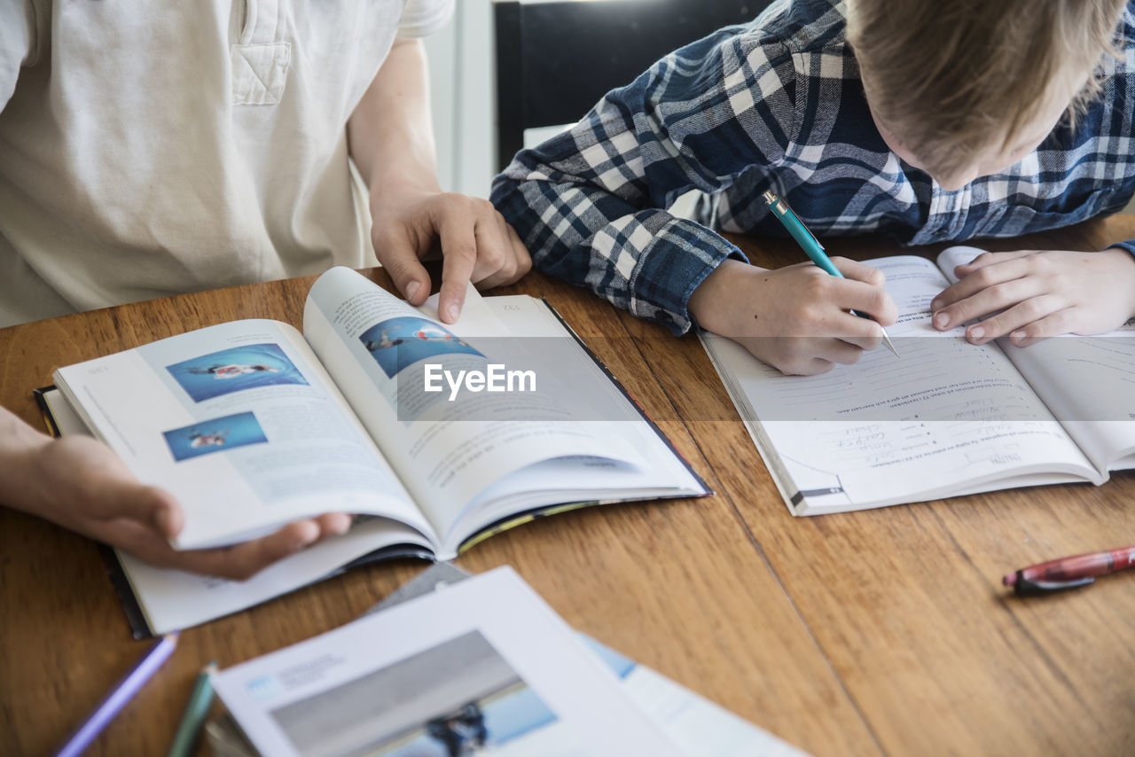 Brothers doing homework