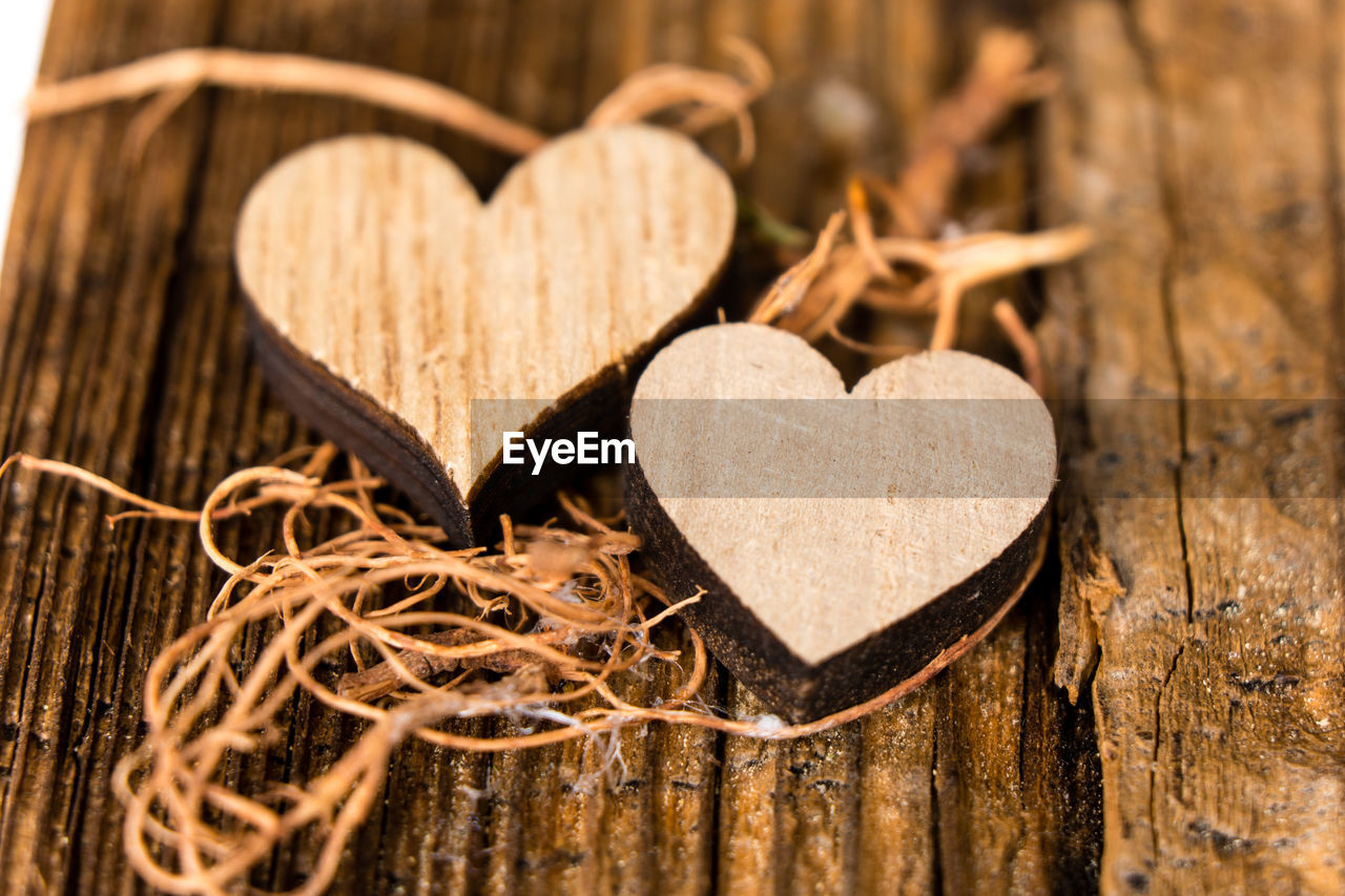 Close-up of heart shapes made of wood