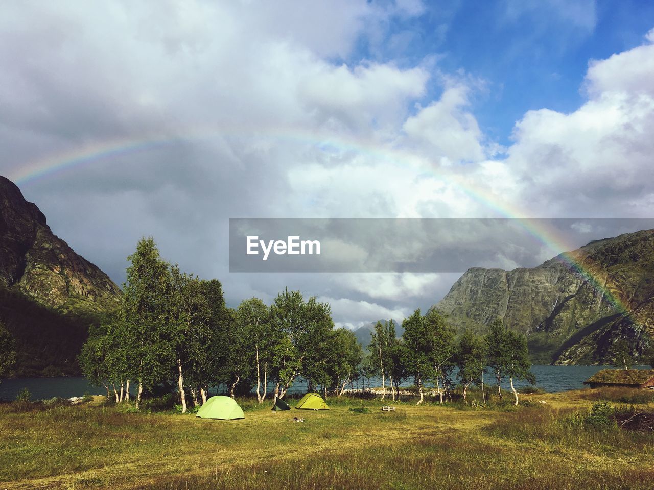 SCENIC VIEW OF LANDSCAPE AND MOUNTAINS AGAINST SKY