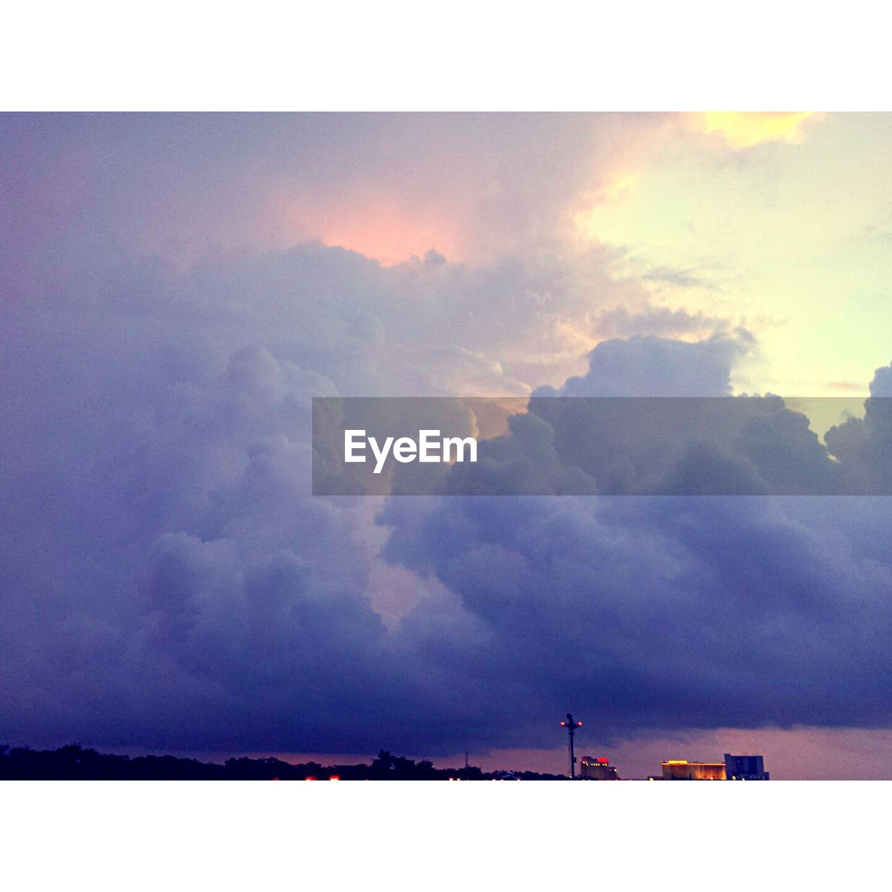 SCENIC VIEW OF CLOUDY SKY OVER LANDSCAPE