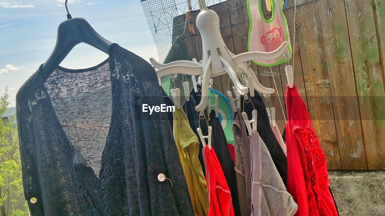 Close-up of clothes hanging outdoors