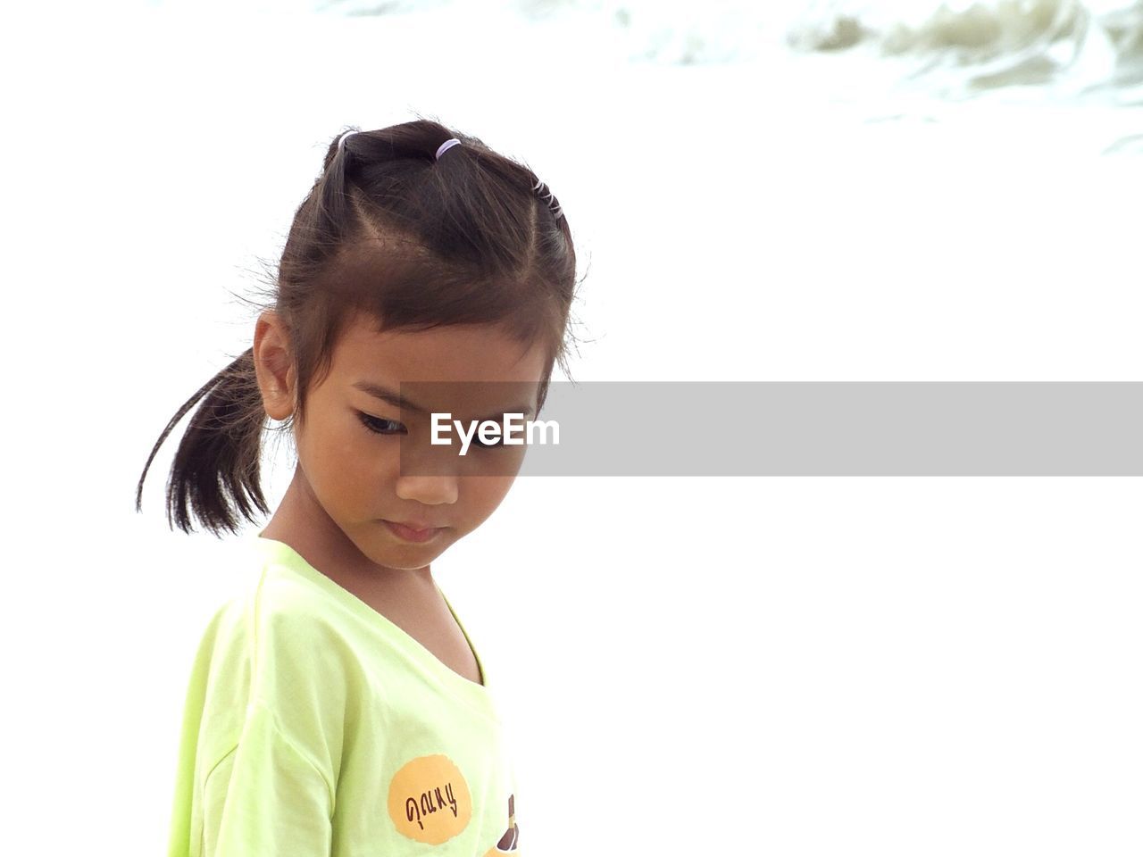 Close-up of girl looking down