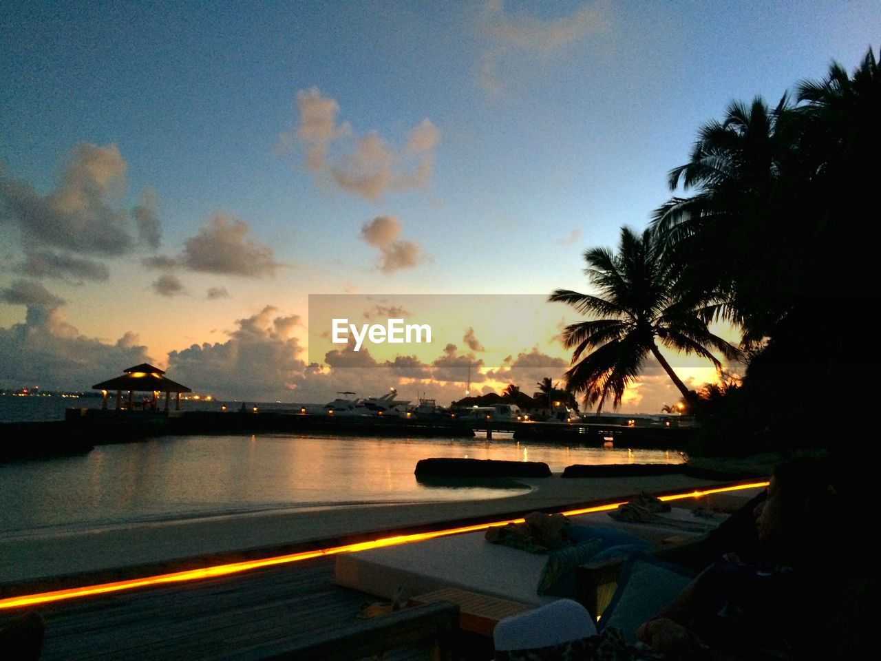 VIEW OF RIVER AT SUNSET