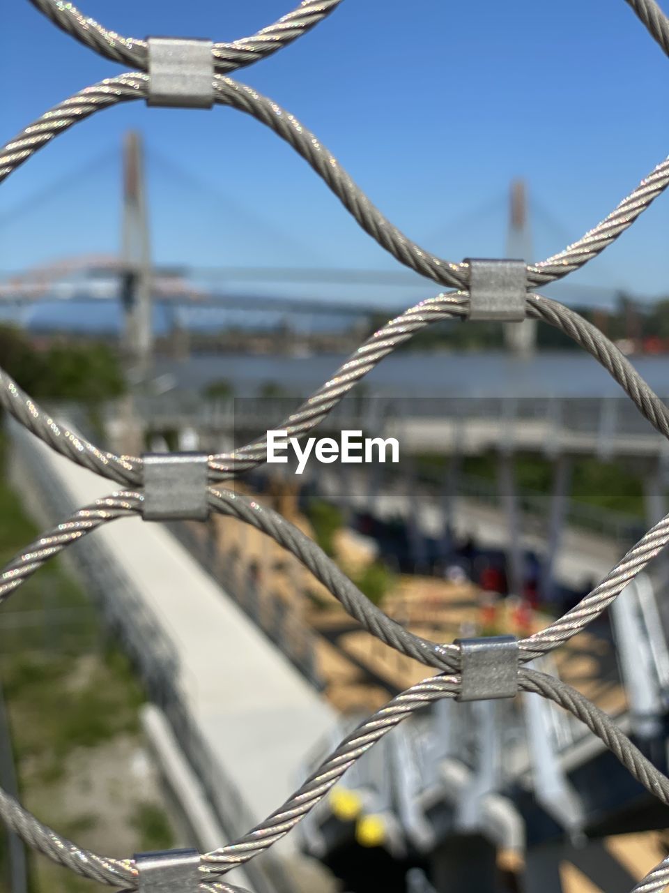 Bridge through a fence