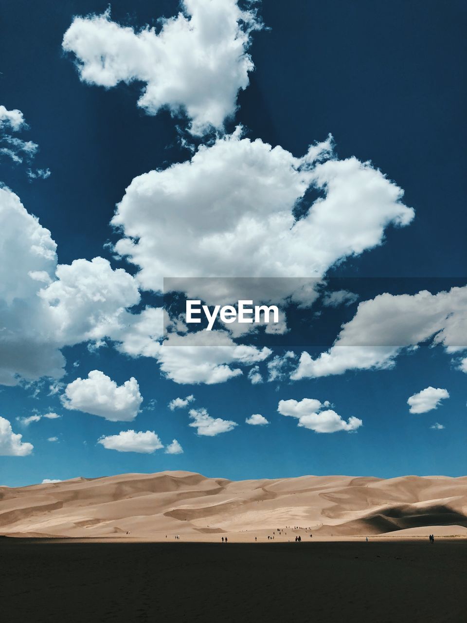 SCENIC VIEW OF ARID LANDSCAPE AGAINST SKY