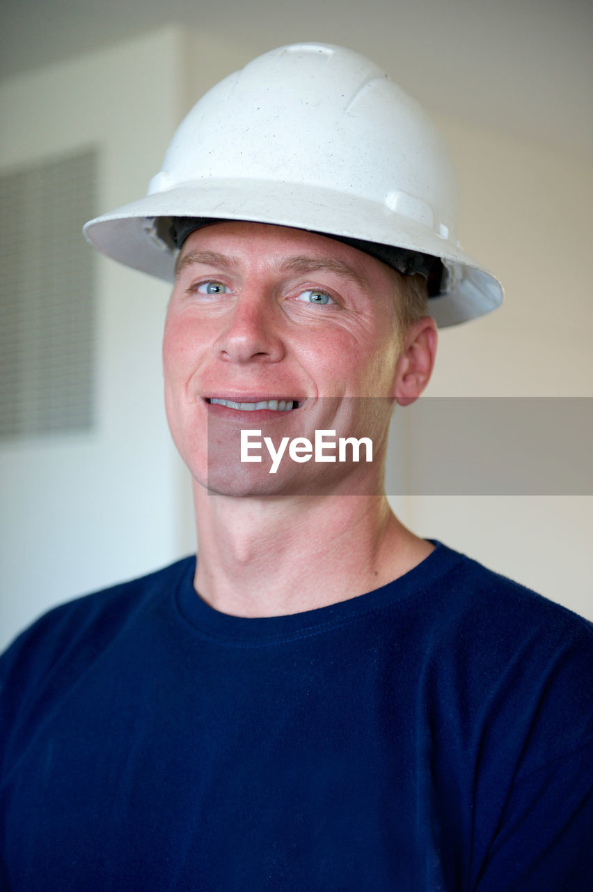 Portrait of man in hardhat