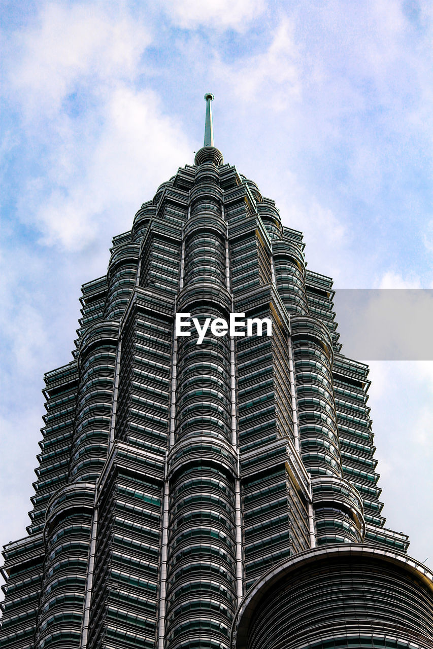 Low angle view of skyscraper against sky