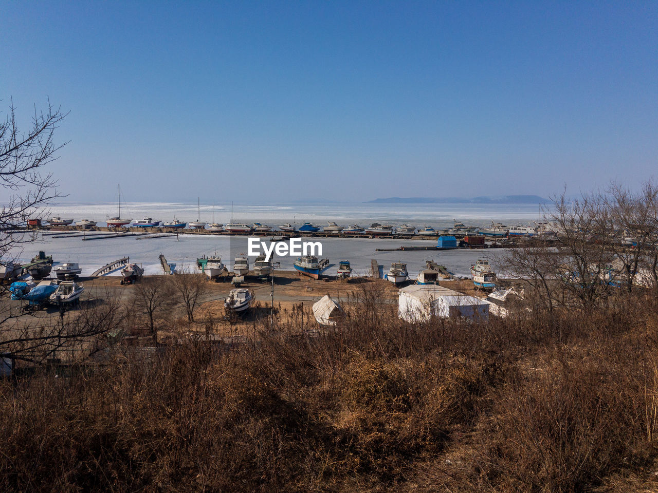 SCENIC VIEW OF BEACH AGAINST CLEAR SKY