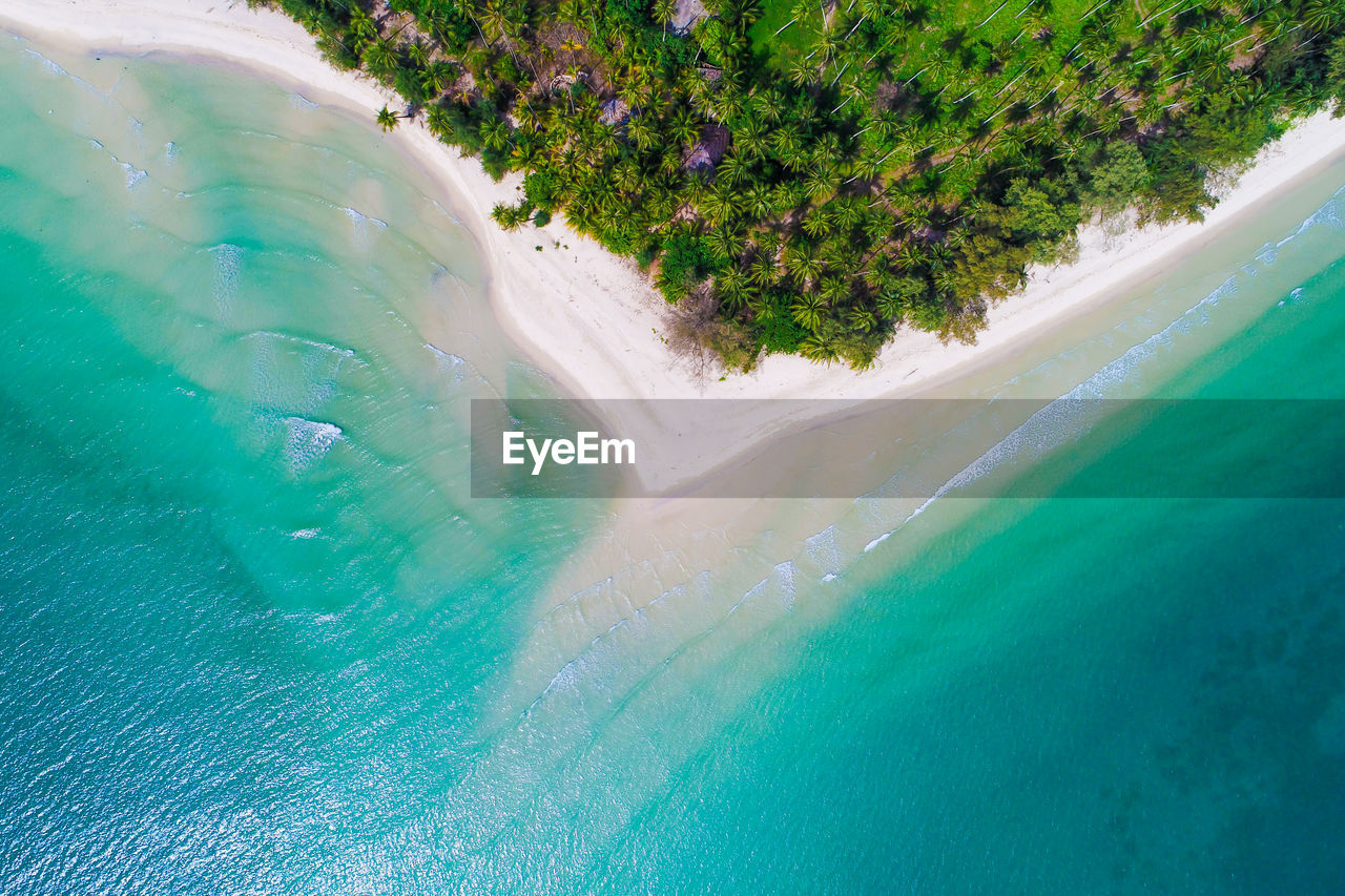 HIGH ANGLE VIEW OF SWIMMING POOL ON SEA