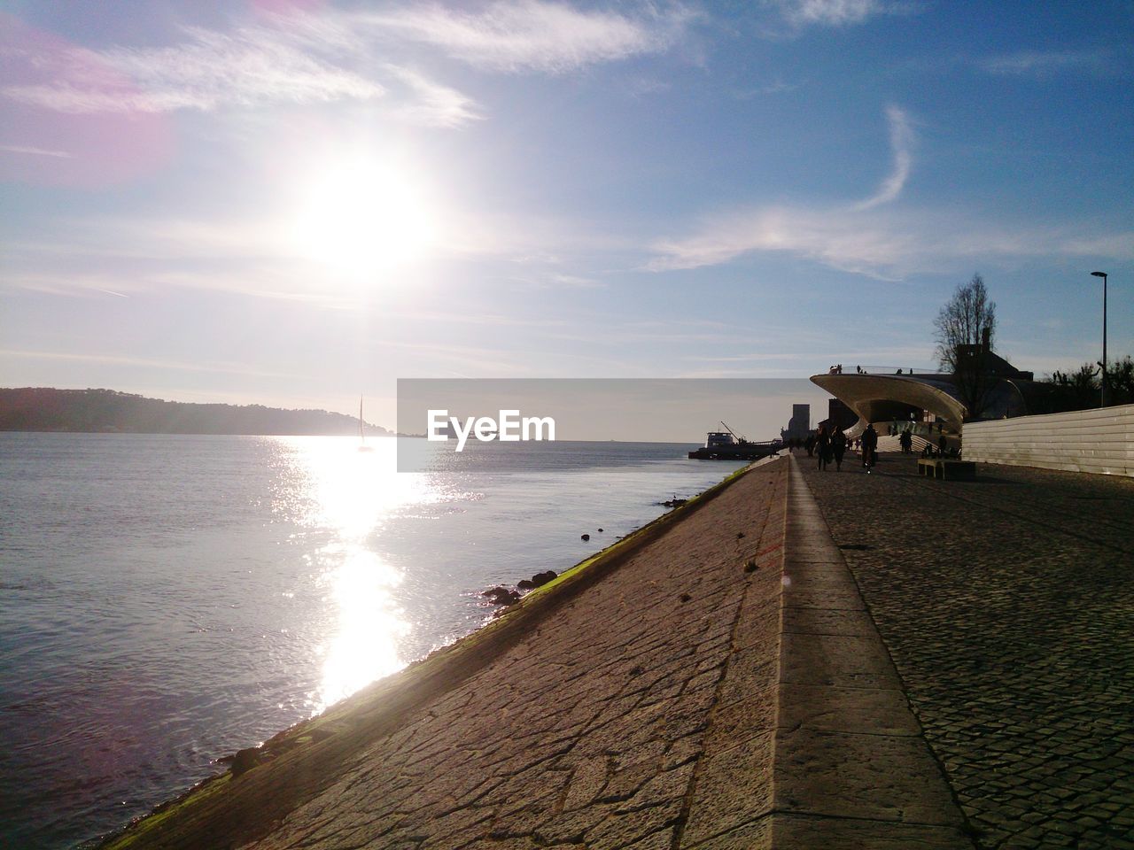 SCENIC VIEW OF SEA AGAINST BRIGHT SKY