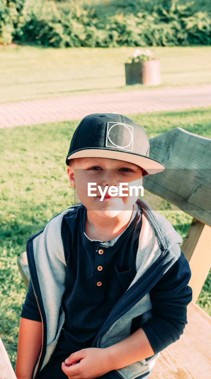 Portrait of boy wearing baseball cap