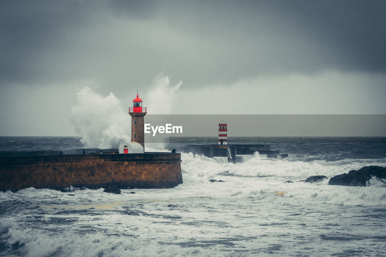 Lighthouse in stormy seas 