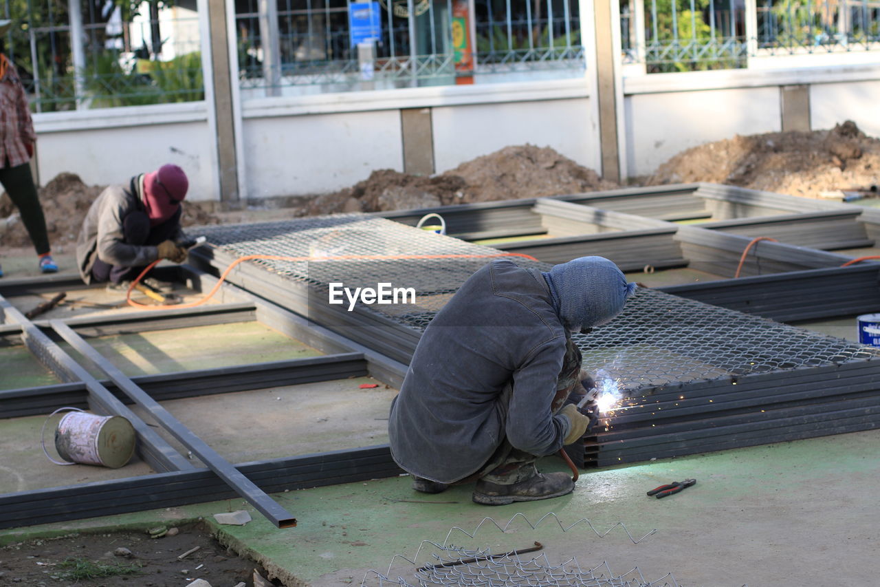 Workers working at construction site