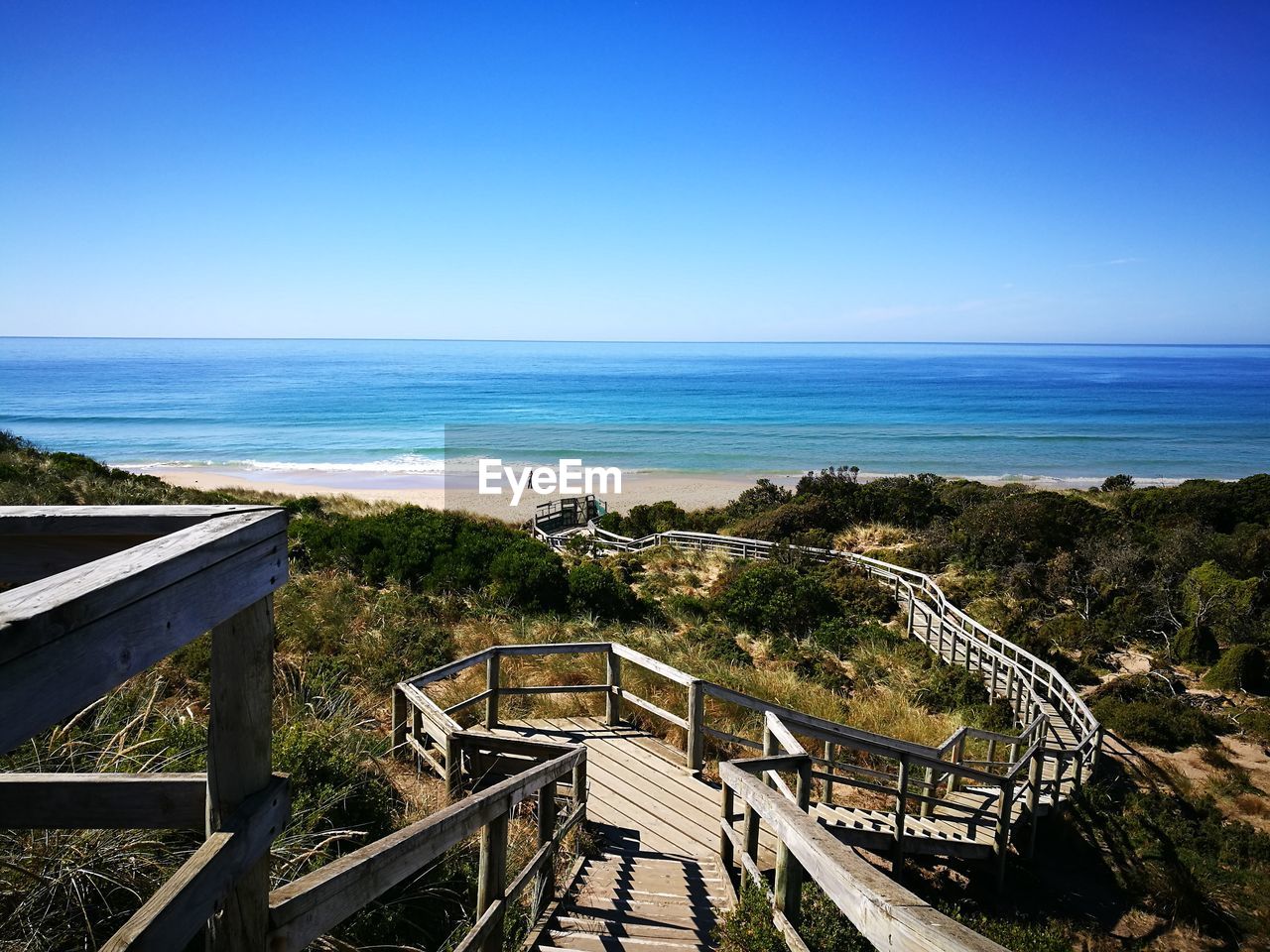 High angle view of beach against clear blue sky