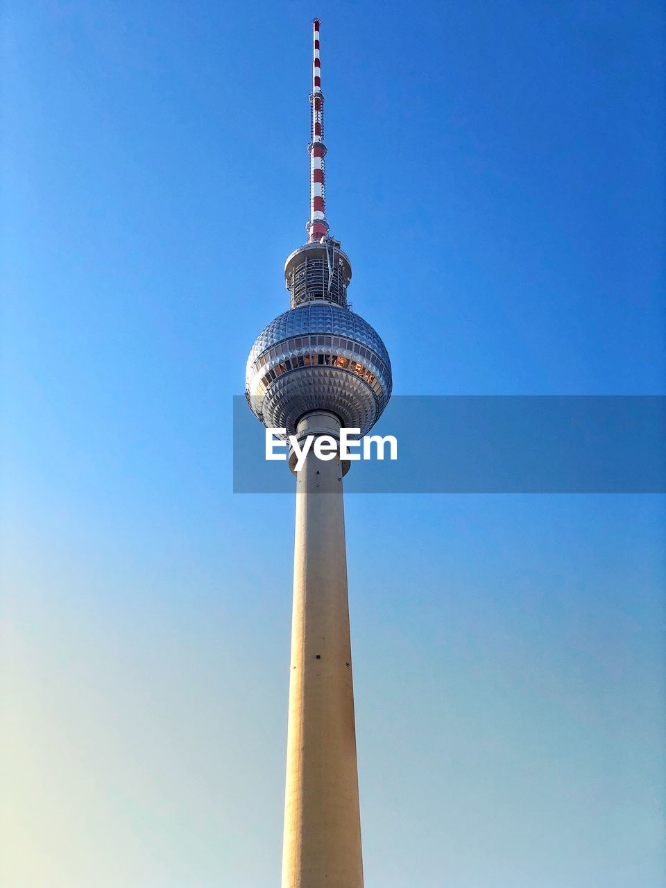 LOW ANGLE VIEW OF TOWER AGAINST BLUE SKY