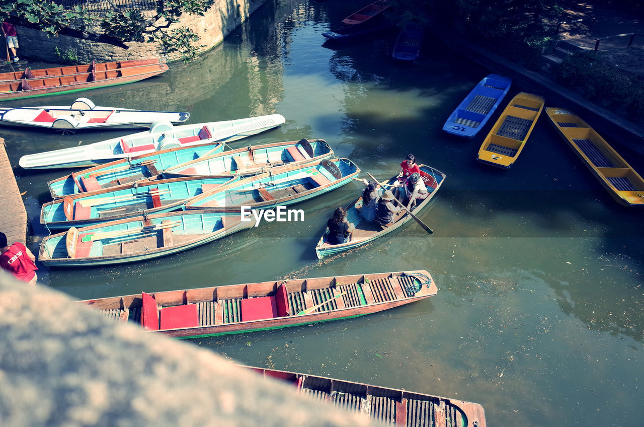 VIEW OF BOATS IN RIVER