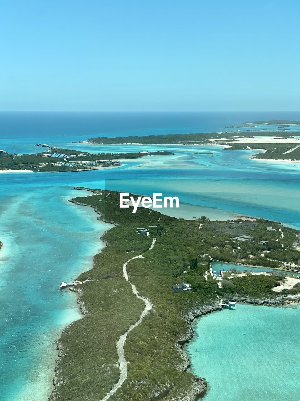 SCENIC VIEW OF BEACH AGAINST CLEAR SKY