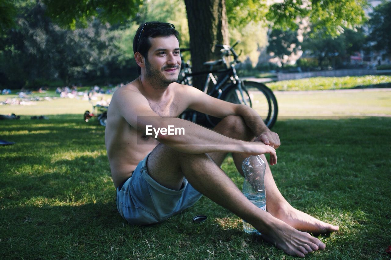 Young man resting in a park