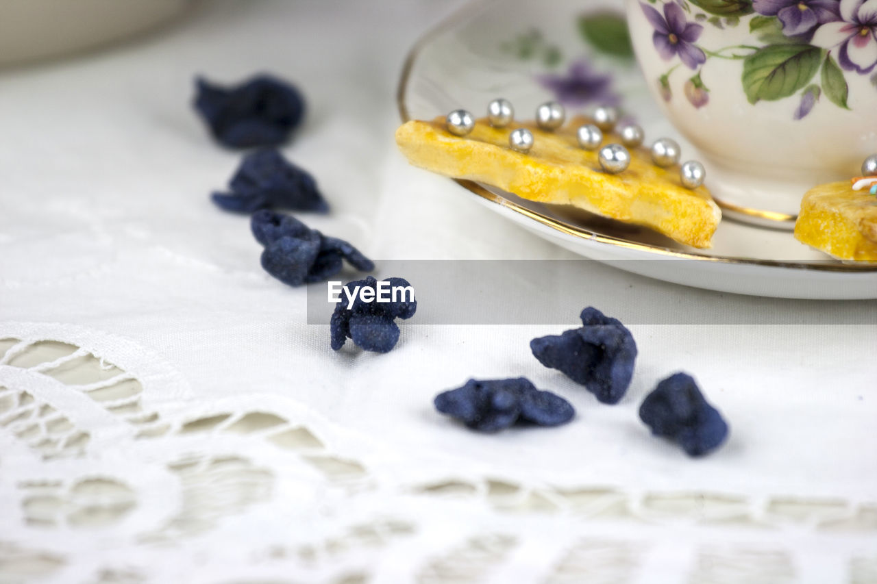 Close-up of flowers on table