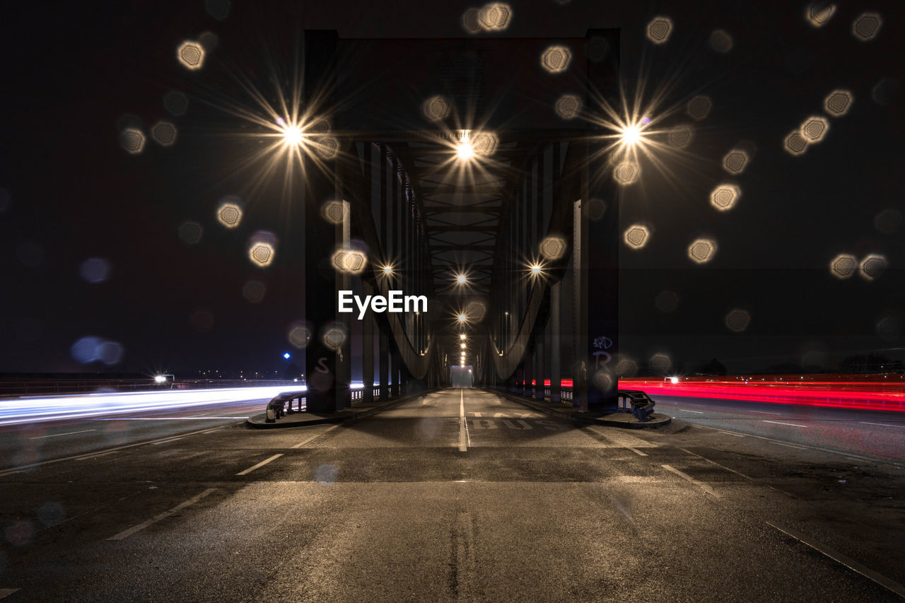 Illuminated road at night