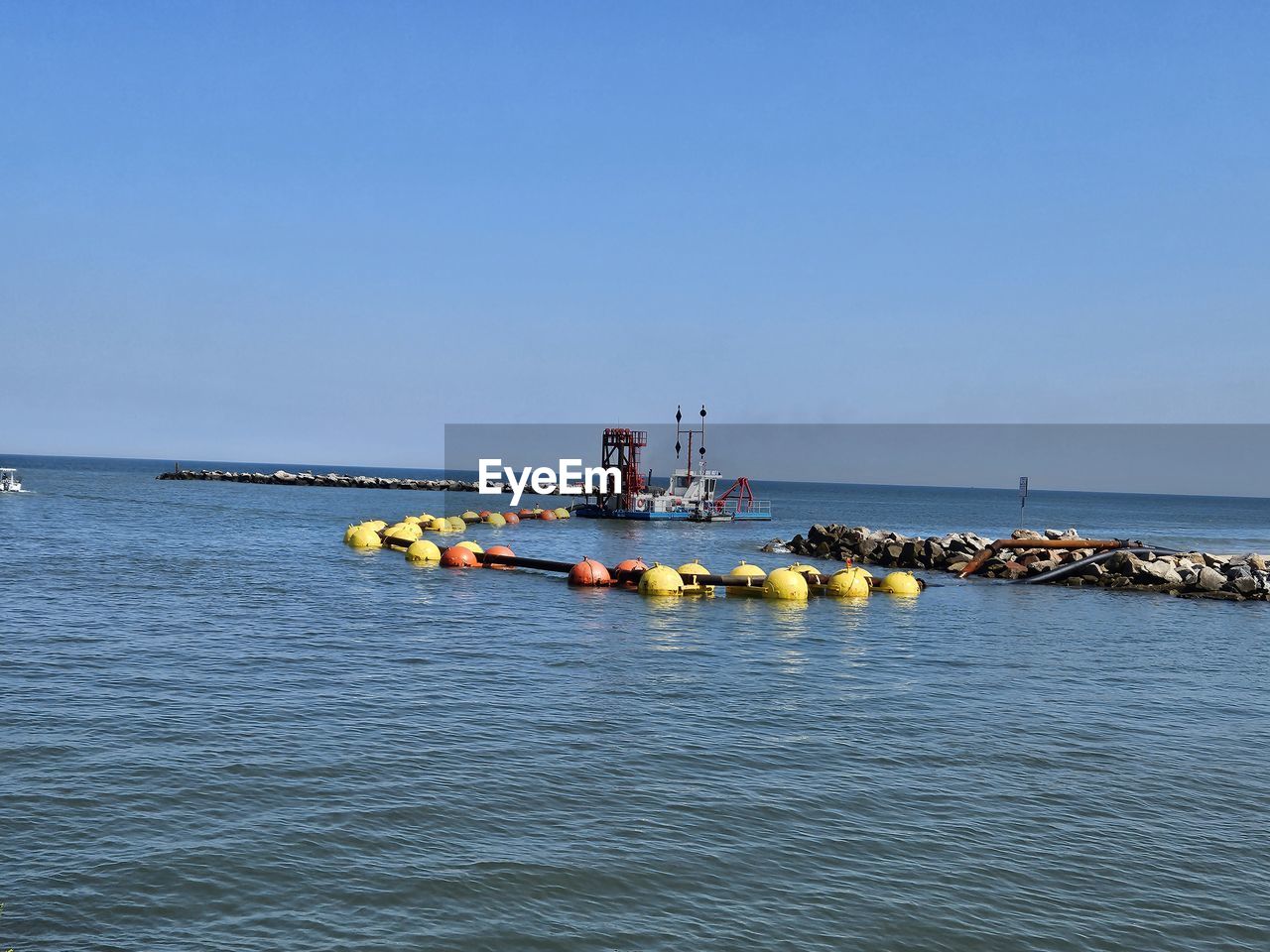 water, sea, transportation, vehicle, sky, nautical vessel, nature, boat, boating, blue, clear sky, day, copy space, mode of transportation, horizon over water, scenics - nature, outdoors, travel, horizon, bay, coast, beauty in nature, watercraft, tranquility, shore, ocean, land, kayak, sunny, group of people, beach, non-urban scene, tranquil scene, waterfront, travel destinations, buoy