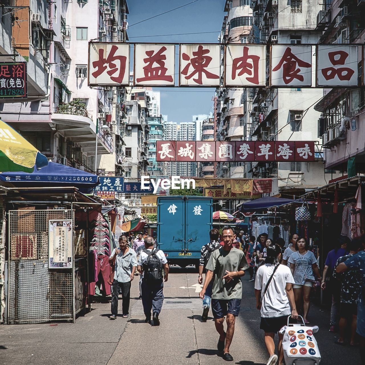 PEOPLE WALKING ON STREET