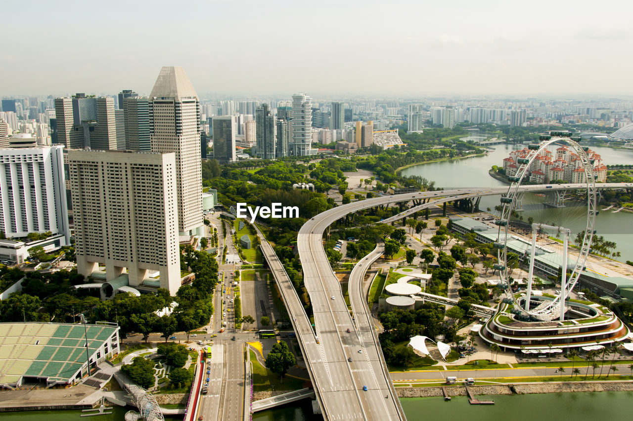 High angle view of city and buildings against sky