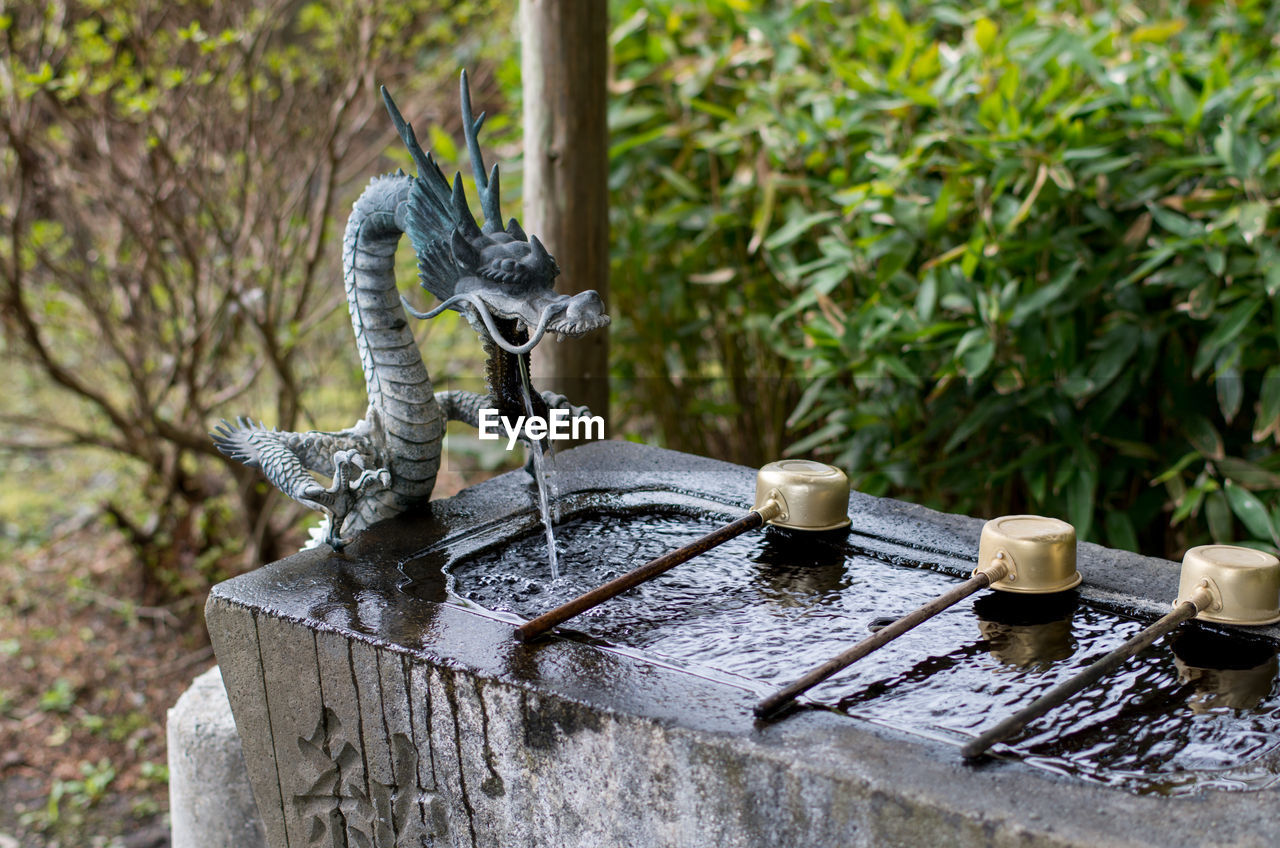 CLOSE-UP OF FOUNTAIN IN WATER