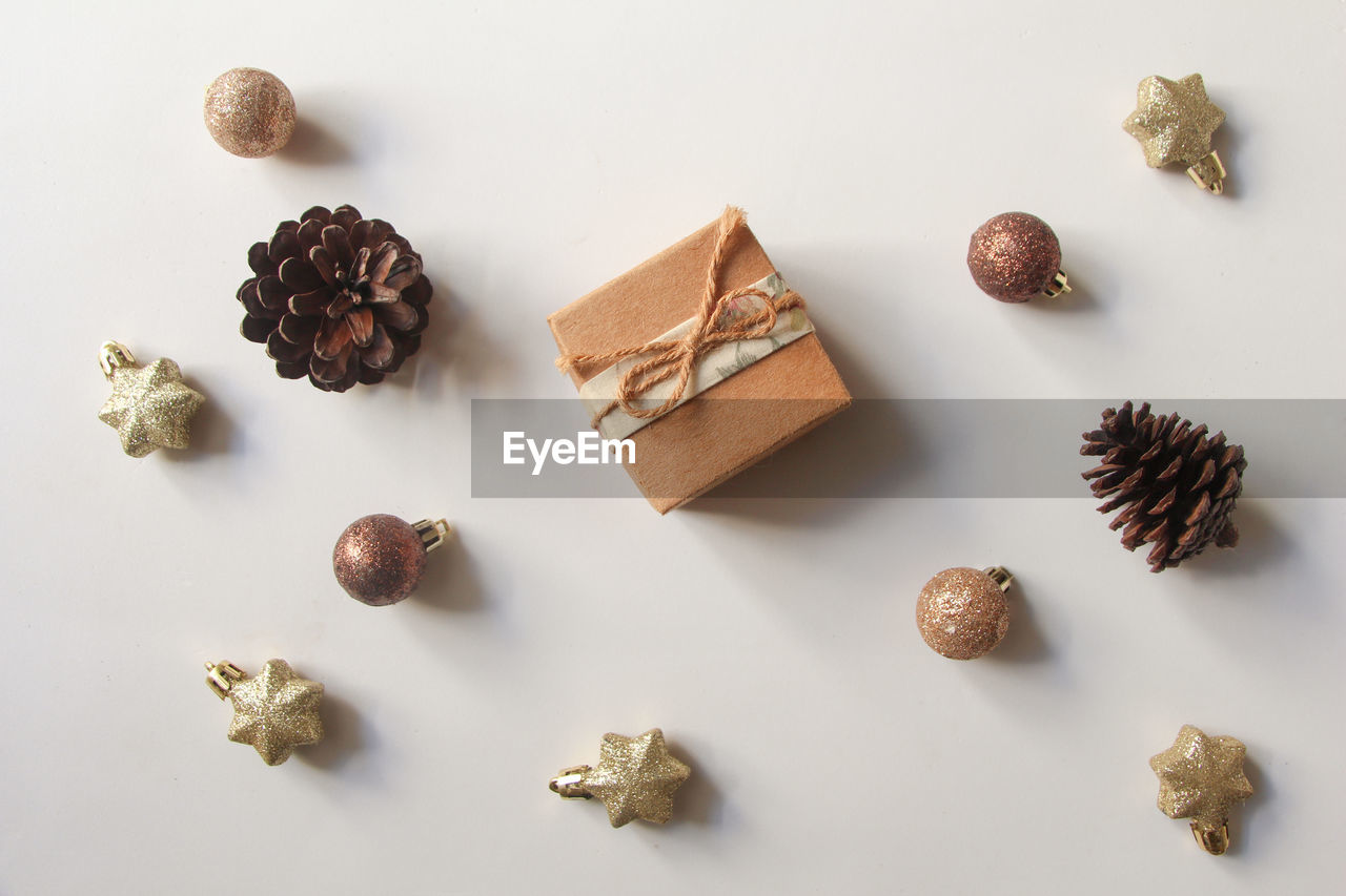 Close-up of christmas decorations on white background